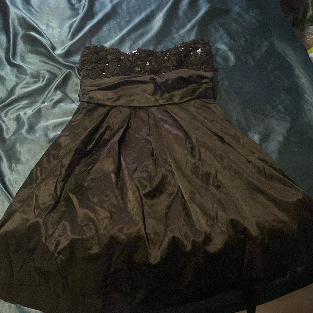 Black mini dress with ruffled sequin flower top